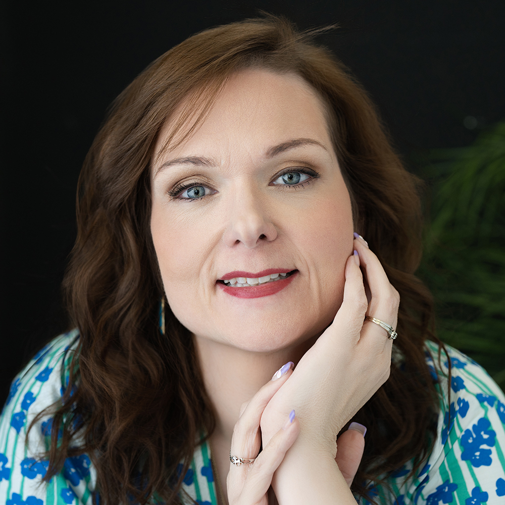 Becky Beach, AI Business Strategist and creator of The Anti-Doorbuster System